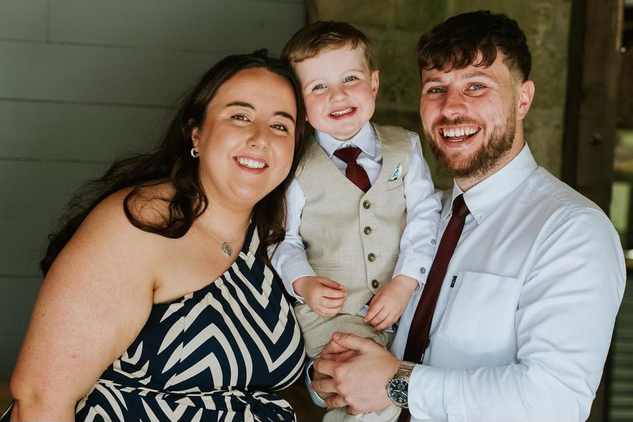 Jack, Jordan and Louie together, smiling at the camera